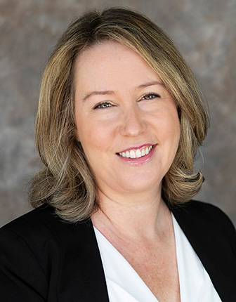 Headshot photo of Marina Owen.