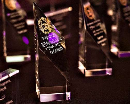 Glass awards on a desk.